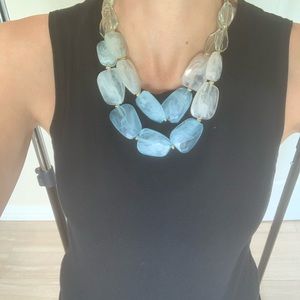 Necklace with blue light green and white beads